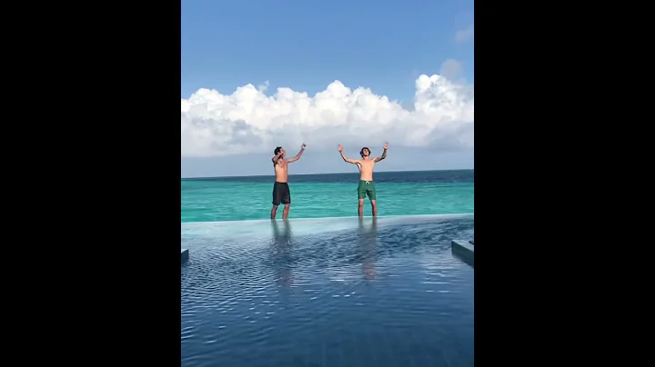 Alexander Zverev and Marcelo Melo dancing in the m...