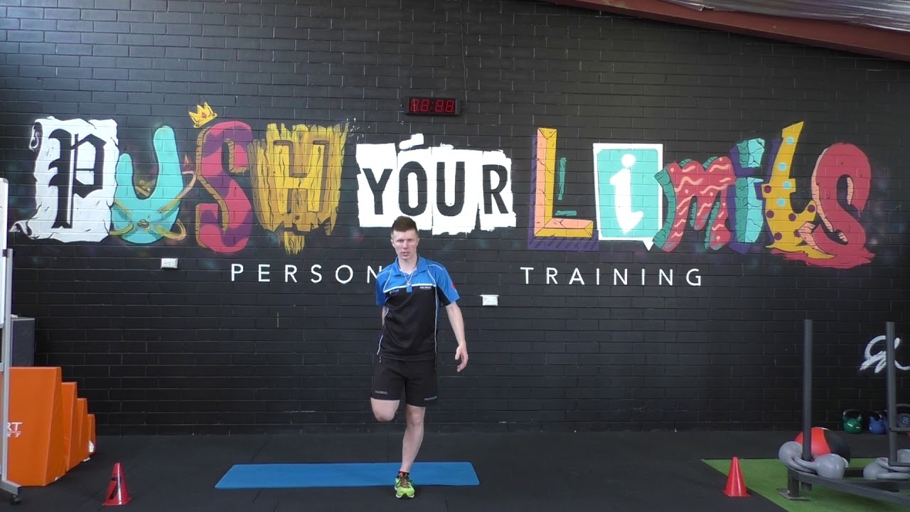 quad stretch standing