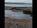 После обмеления Днепра в районе центрального пляжа Запорожья обнажились трубы ливневой канализации