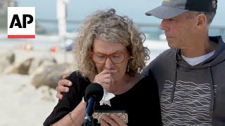 The mother of killed Australian surfers gives a moving tribute to her sons at a beach in San Diego