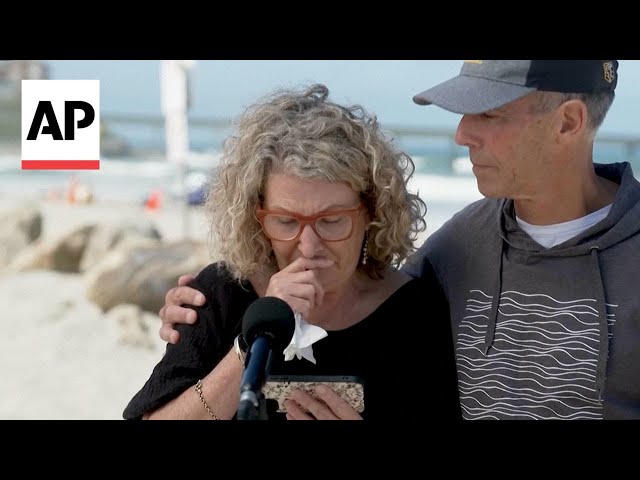 The mother of killed Australian surfers gives a moving tribute to her sons at a beach in San Diego
