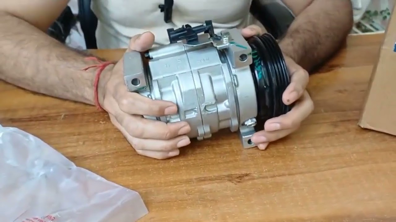 Old Wagonr AC Compressor. Wagonr AC Compressor Price.