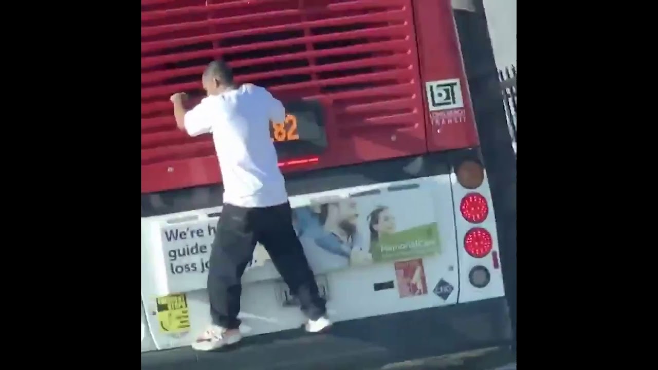 Man Hanging on the Back of a Bus in California - YouTube