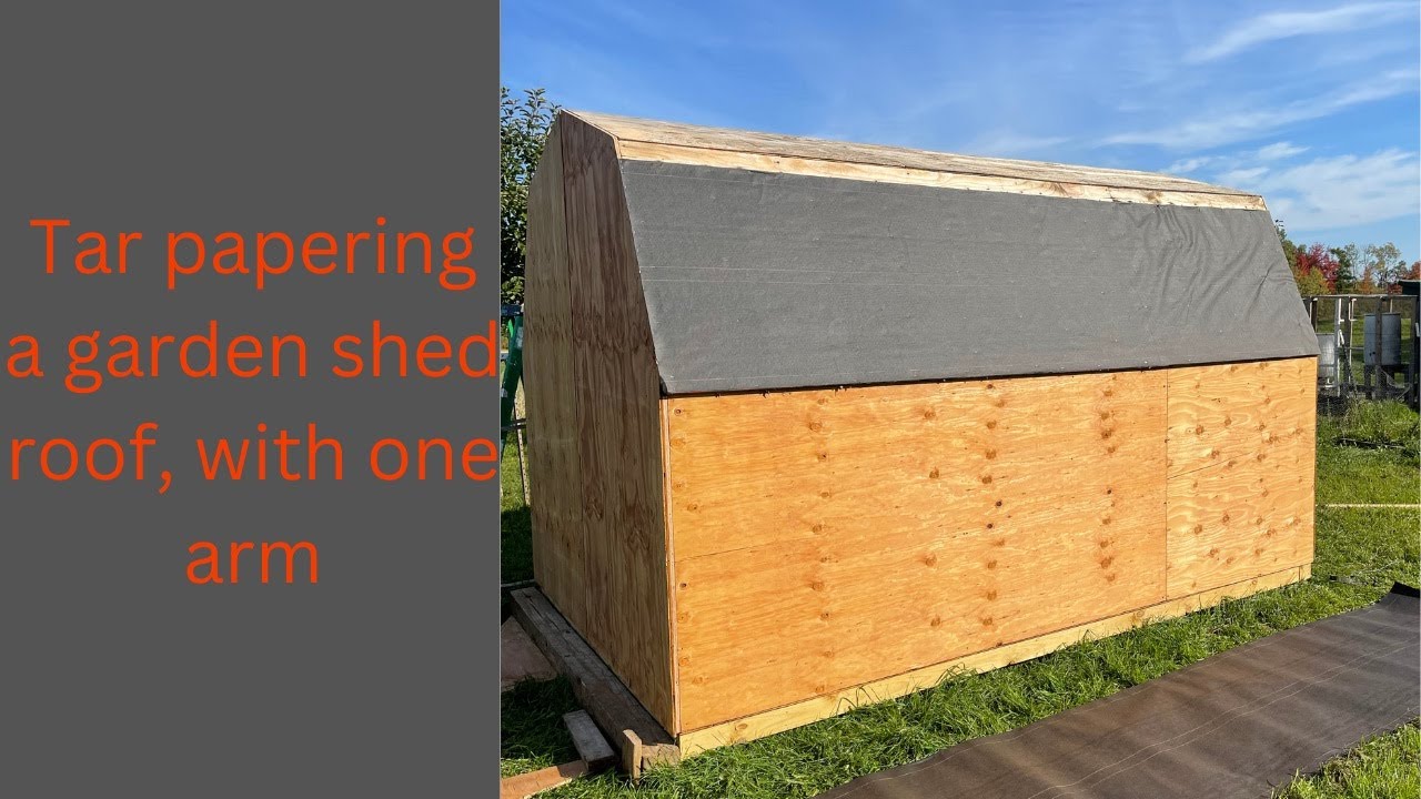 Tar papering a garden shed roof, with one arm. - YouTube