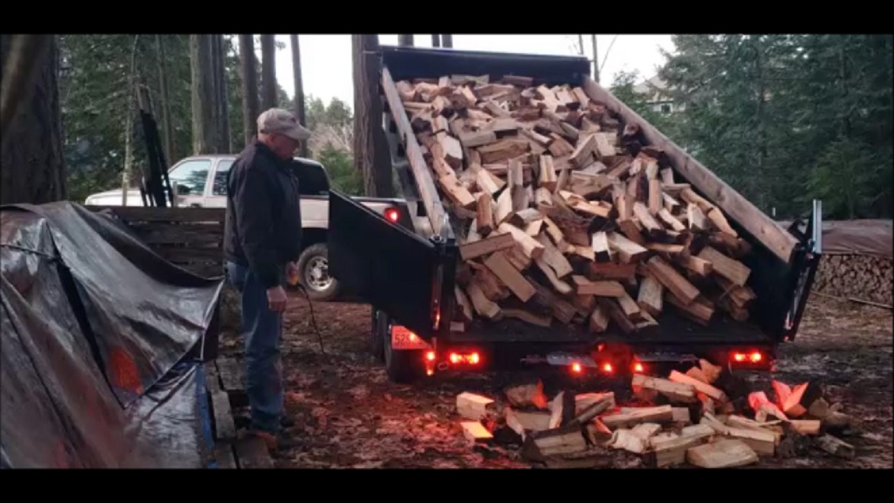 Dumping Firewood Using A Dump Trailer - YouTube