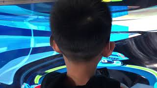 (RSD360) Little boy is fun playing his U-turn in futuristic racing game HexGL