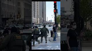 "trained professionals" thwarted by dude on a bike