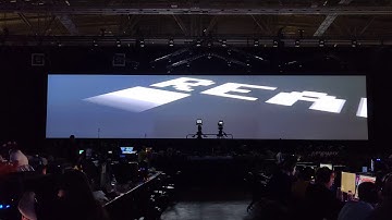 Assembly Summer 2019 Real Wild Compo intro on a 7500x1500 screen