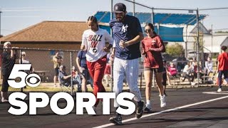 Razorback softball superfan becomes a best friend