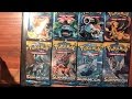 Opening 4 pokemon xy evolutions and 4 sun  moon booster packs