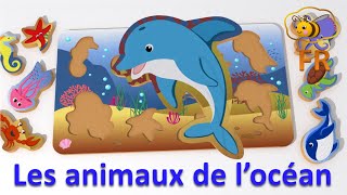 Les animaux de l’océan en français. Jouets pour bébé : casse-tête avec les animaux aquatiques