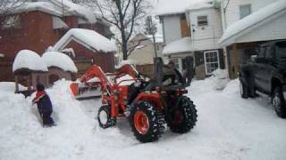kids plowing snow 2010.avi
