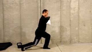 Contralateral front rack reverse lunge