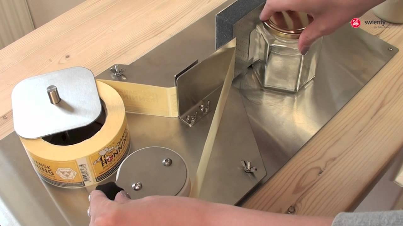 Etiqueteuse manuelle pour bocaux en verre