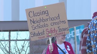 Lawrence parents rally against school closures