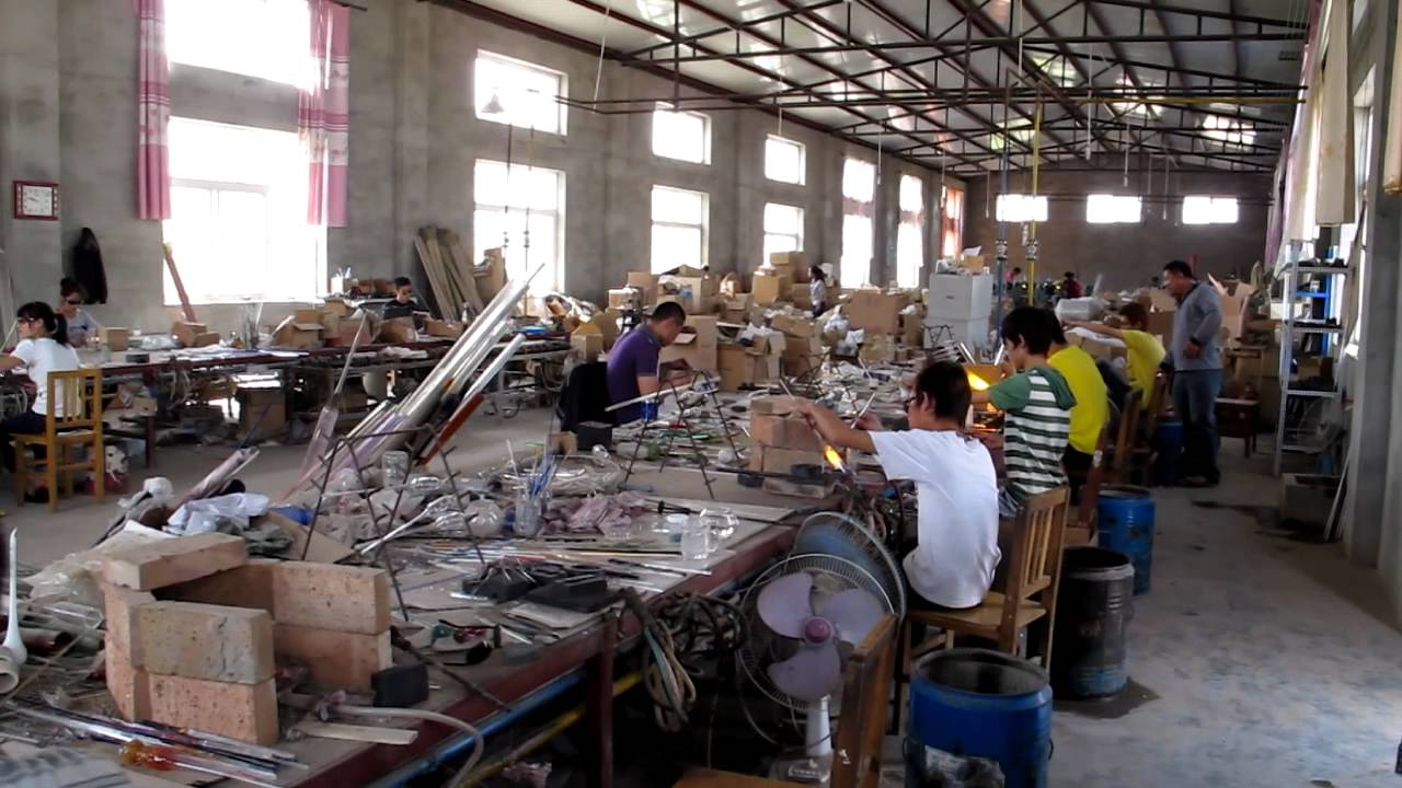 workroom of blowing glass pipes , glass bongs and water pipes