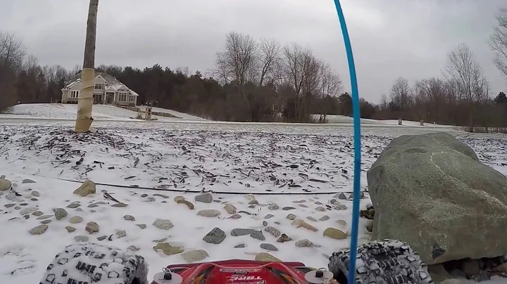 Monster Traxxas Rustler VXL in snow