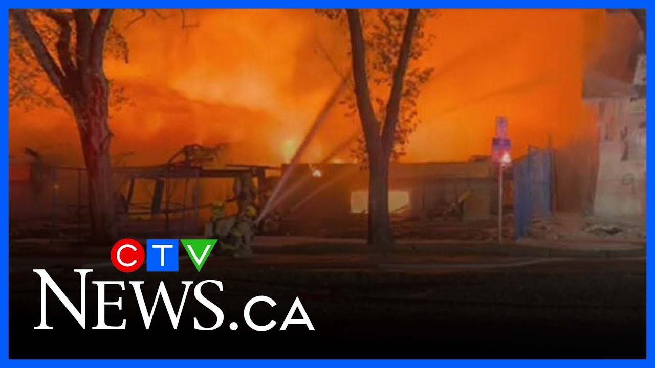 Regina fire crews respond to large blaze on Victoria Ave - YouTube
