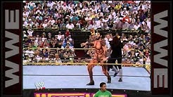 The Undertaker faces the towering Giant Gonzalez at