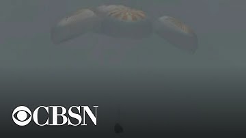 SpaceX capsule and NASA astronauts return to Earth in first splashdown since 1975