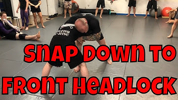 Snap down to front headlock from the over under