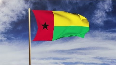 4K Guinea-Bissau flag waving in the wind. Green screen, alpha matte. Loopable animation Stock video