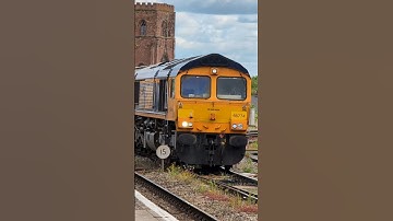 GBRf 66774 "Sue Coles" passes Shrewsbury with cement wagons