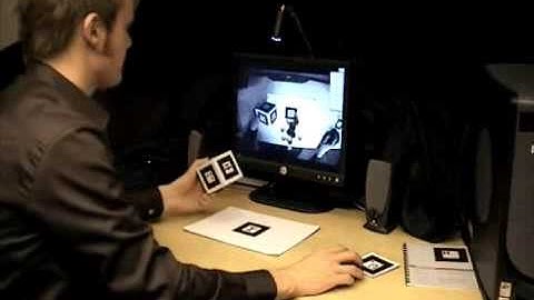 Tangible user interface for chemistry education: comparative evaluation and re-design