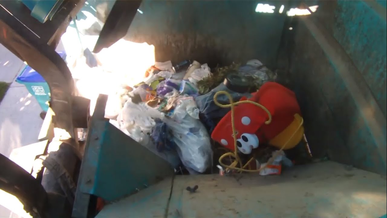 GoPro on a Garbage Truck • McNeilus Side Loader Packing HOA Trash