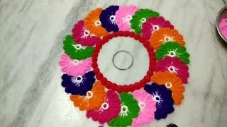 Easy rangoli design with colours // simple round rangoli design //beautiful innovative bangle design screenshot 3