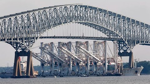 Francis Scott Key Bridge in Baltimore collapses after ship struck it, sending vehicles into water