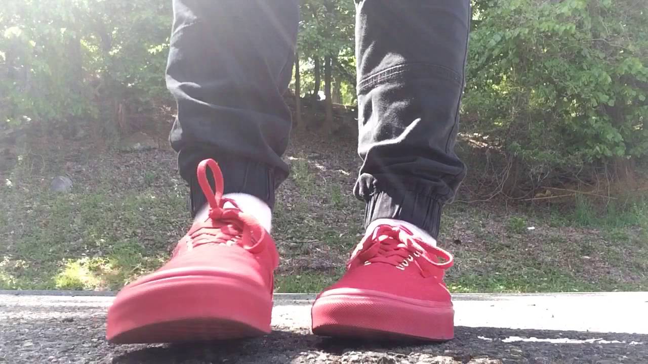 all red vans on feet