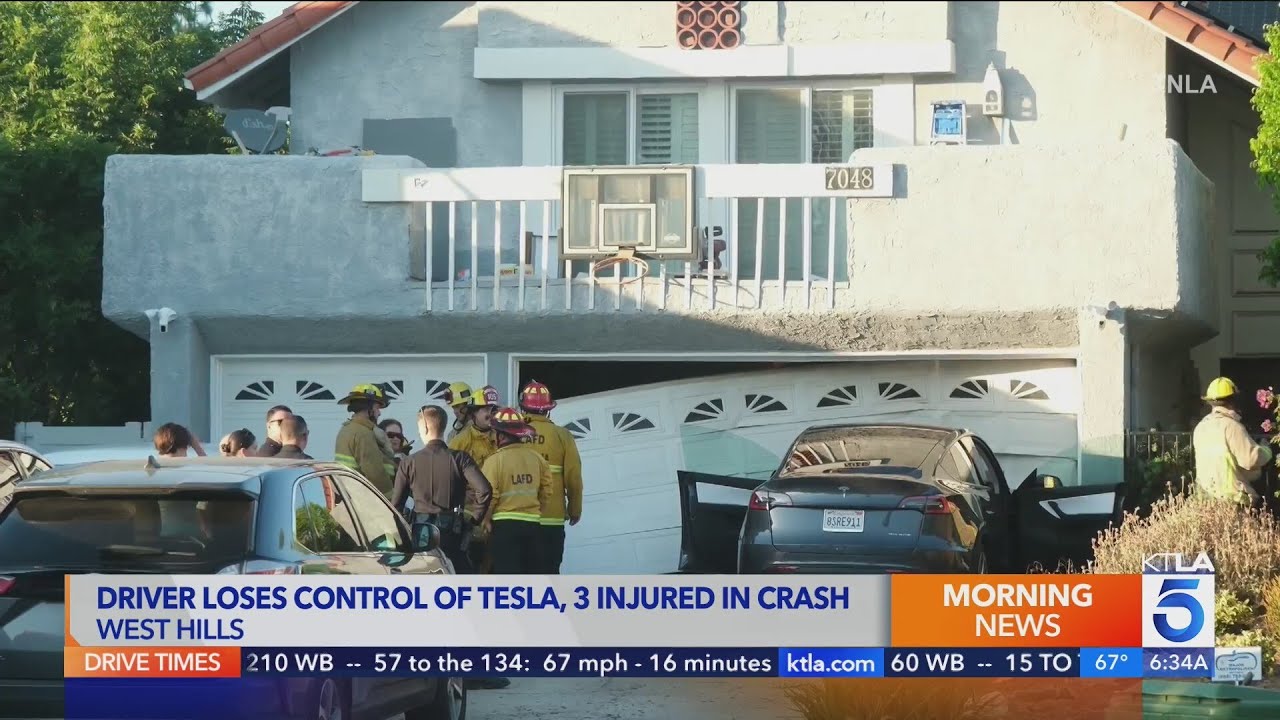 3 injured after Tesla driver loses control, crashes into garage - YouTube