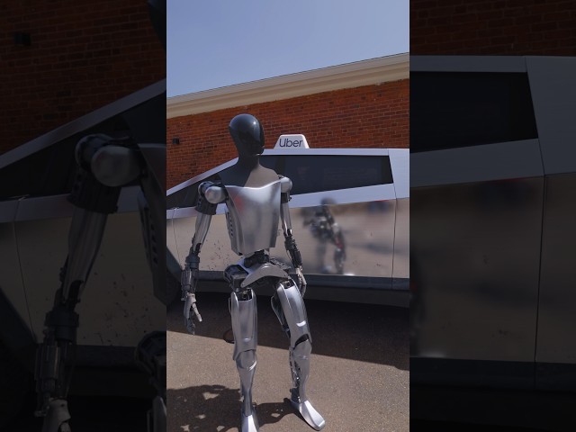 Tesla Robot Driving a Cybertruck for Uber class=