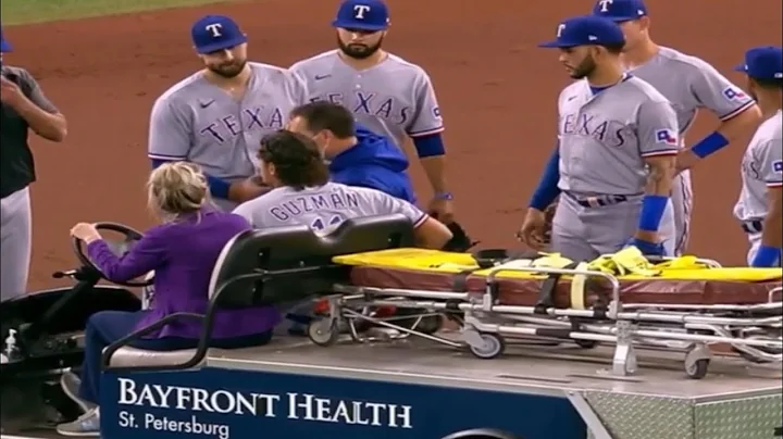 Ronald Guzman carted off after leg injury