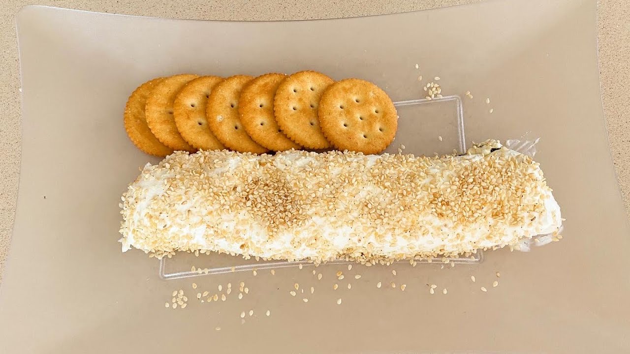 Rollo de queso philadelphia con ostiones ahumados