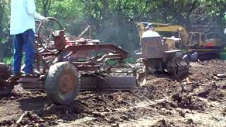 spring fling 2009 My 1929 caterpillar 10 pulling a caterpillar pull grader at fling 09