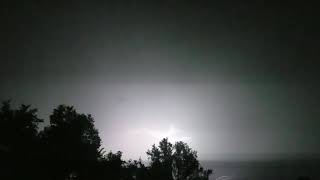 Flashes Of Lightening Bolts Branching Across The Sky