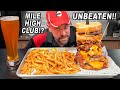 Join the mile high club by eating in plane views undefeated burger challenge in milwaukee