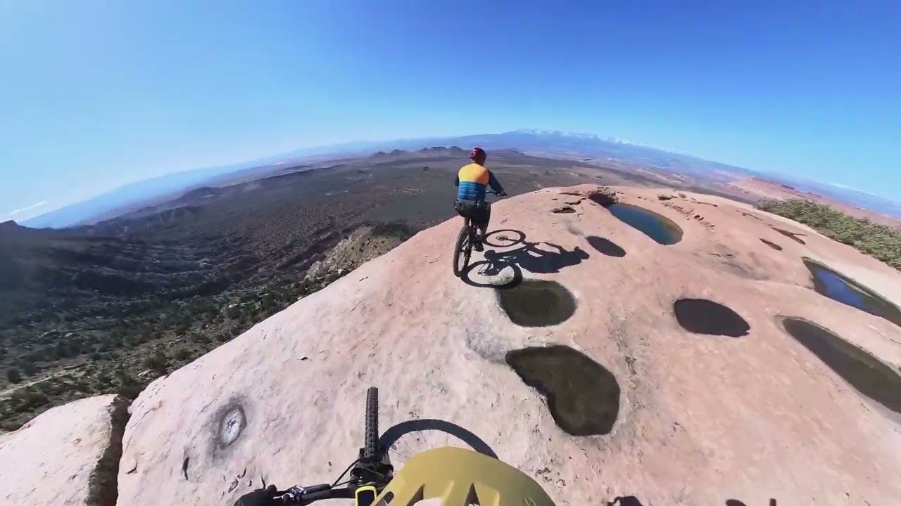 Riding the edge of the "Hot Tub" on Little Creek Mesa - Utah