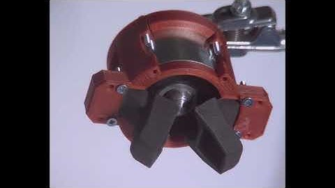 Magnetically guided soft robotic grippers