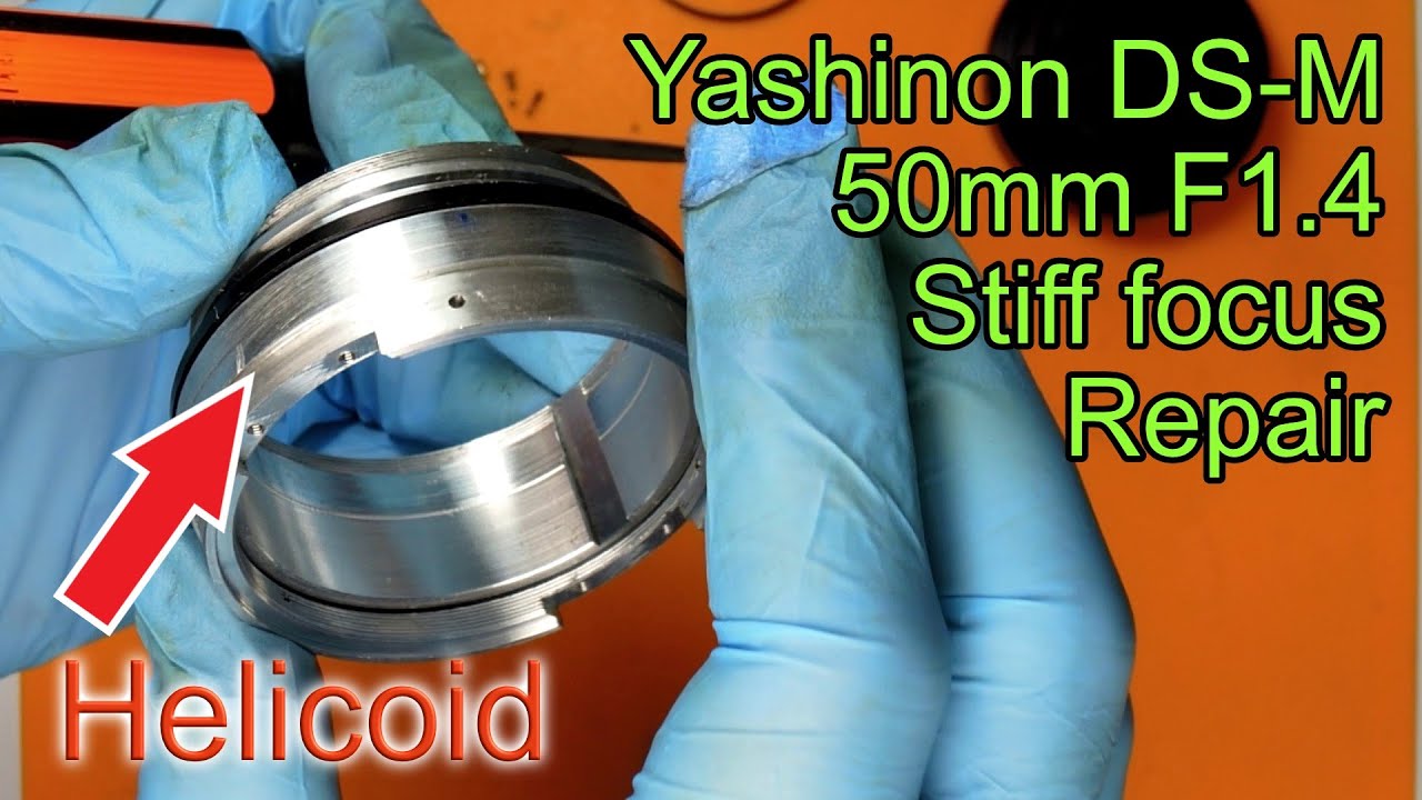 Repairing stiff focus on Yashinon DS-M 50mm F1.4 lens. - YouTube