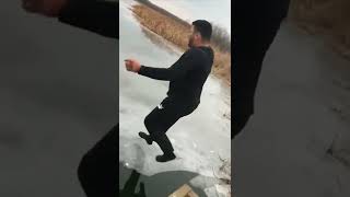 Guy Fell in Water Jumping in a Frozen River