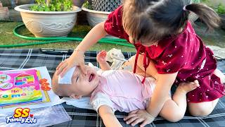 Diem was curious to see Baby Kim's new teeth, which made Kim cry