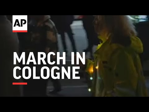 Protesters march in Cologne against COVID restrictions