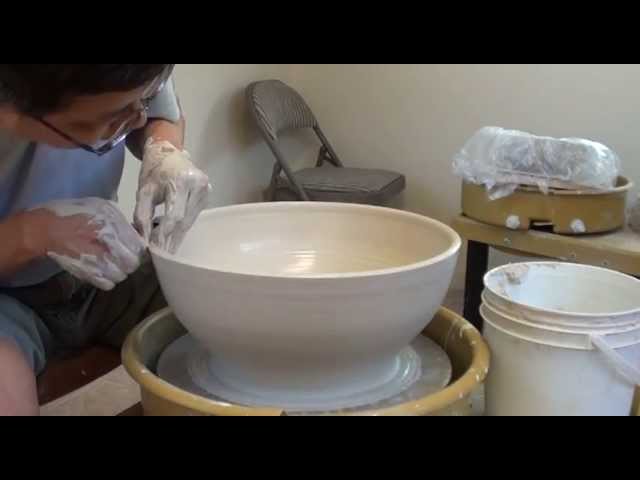 Wedging Clay in Preparation for Wheel Throwing Pottery 