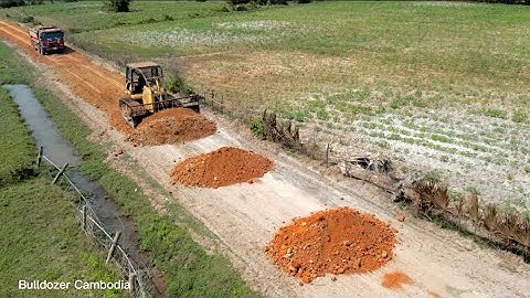 Collaborate to develop new roads closer to the target using a big dozer attached to the side trumpet