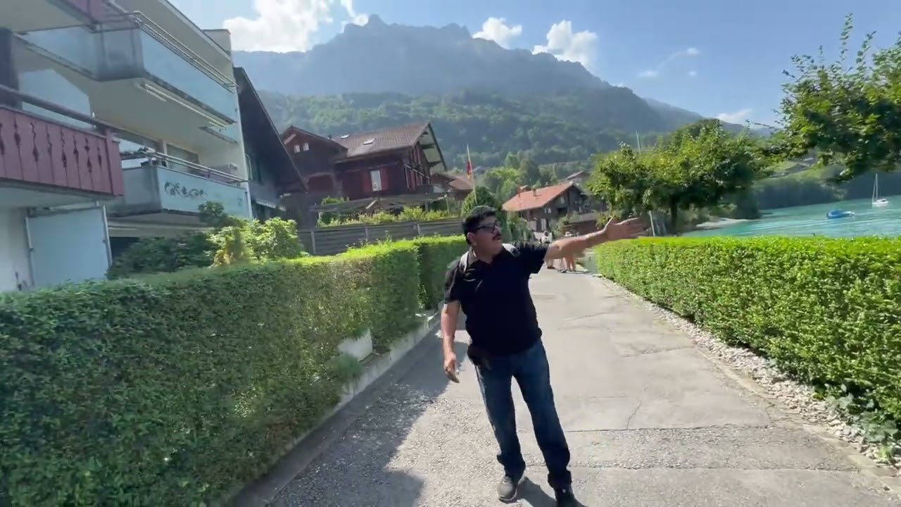 Summer walk in Swiss Village Iseltwald Switzerland’s Most Beautiful Town Near Interlaken