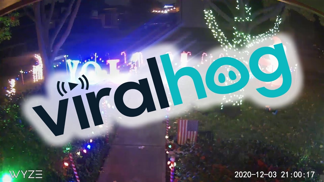 Car Drives Through Christmas Display || ViralHog - YouTube