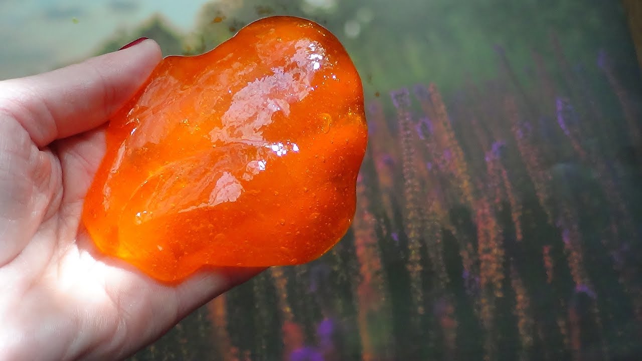 слизень оранжевого цвета. съедобные слаймы из фаньы. оранжевая слизь на винограде. лизун оранжевый. оранжевая сопля.